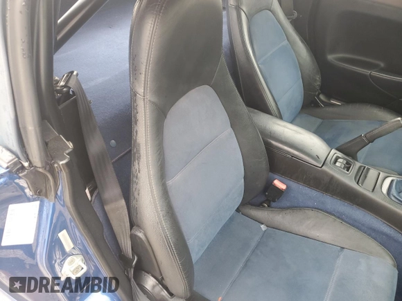 1999 Mazda MX-5 Miata with VIN JM1NB3532X0134801, listed as a Copart auction lot 83838374 with 97,015 mi miles and Salvage title. Bid and sale history available at DreamBid. Image 10.