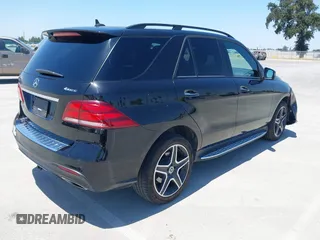 2018 Mercedes-Benz GLE 550e with VIN 4JGDA6DB8JB166698, listed as a IAAI auction lot 42483143 with 77,601 mi miles and . Bid and sale history available at DreamBid. Image 4.