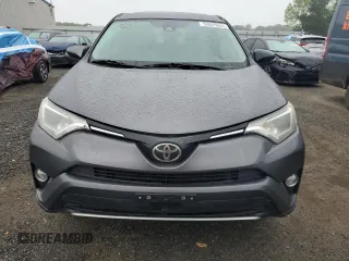 2018 Toyota RAV4 XLE with VIN 2T3WFREV0JW445322, listed as a Copart auction lot 55623845 with 116,700 mi miles and Salvage title. Bid and sale history available at DreamBid. Image 5.
