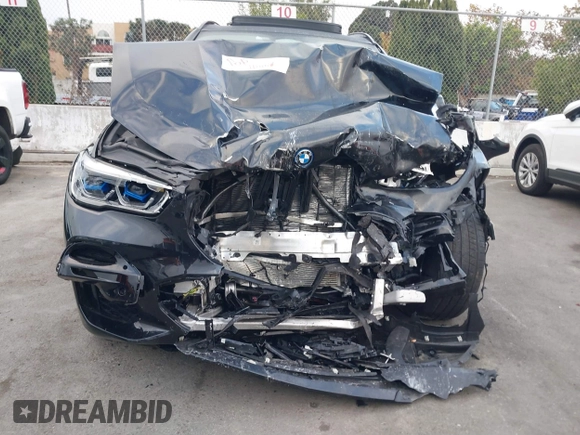 2023 BMW X5 xDrive45e z VIN 5UXTA6C02P9P59732, wystawiony jako IAAI lot #40713343 z przebiegiem Nie podano mil oraz . Historia ofert i sprzedaży dostępna na DreamBid. Obrazek 17.