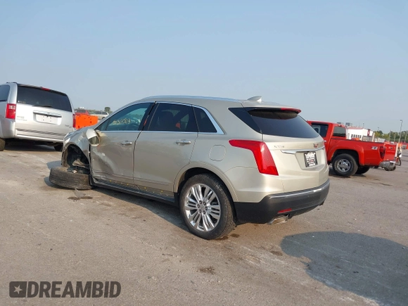 2017 Cadillac XT5 Premium Luxury FWD z VIN 1GYKNCRSXHZ164468, wystawiony jako IAAI lot #40314503 z przebiegiem 94 008 mil mil oraz . Historia ofert i sprzedaży dostępna na DreamBid. Obrazek 3.