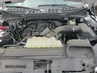 2023 Ford F-150 XL with VIN 1FTFW1E52PFA37996, listed as a Copart auction lot 70727285 with 22,397 mi miles and Salvage title. Bid and sale history available at DreamBid. Image 13.