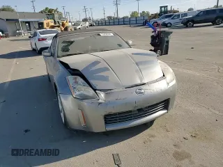 2005 Nissan 350Z Touring z VIN JN1AZ36A15M756659, wystawiony jako Copart lot #75458384 z przebiegiem 101 489 mil mil oraz Szkoda całkowita • Salvage title. Historia ofert i sprzedaży dostępna na DreamBid. Obrazek 11.