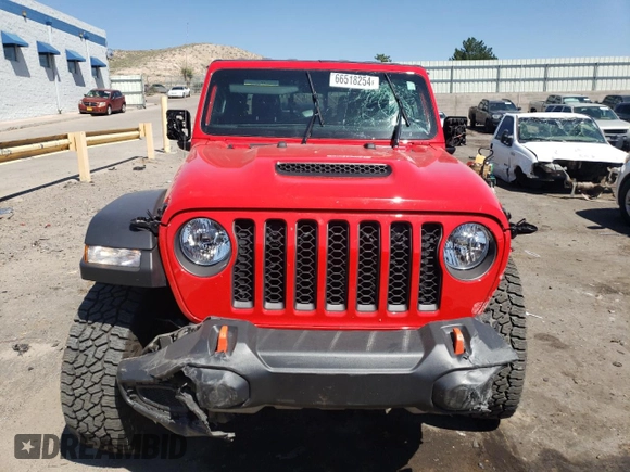 2023 Jeep Gladiator Mojave with VIN 1C6JJTEG0PL582819, listed as a Copart auction lot 66518254 with 12,131 mi miles and Salvage Title. Bid and sale history available at carsss.com. Image 5.