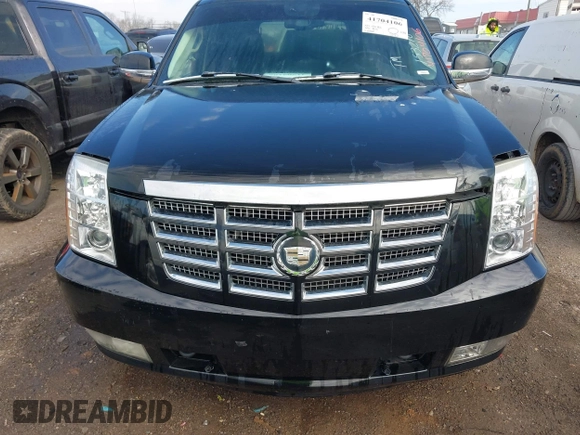 2007 Cadillac Escalade z VIN 1GYFK63857R153210, wystawiony jako IAAI lot #41704106 z przebiegiem 291 658 mil mil oraz . Historia ofert i sprzedaży dostępna na DreamBid. Obrazek 6.