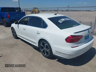 2016 Volkswagen Passat SE z VIN 1VWBS7A3XGC064217, wystawiony jako IAAI lot #41864169 z przebiegiem 136 053 mil mil oraz . Historia ofert i sprzedaży dostępna na DreamBid. Obrazek 3.