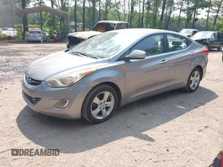 2012 Hyundai Elantra GLS z VIN KMHDH4AE7CU369345, wystawiony jako IAAI lot #42432765 z przebiegiem 148 754 mil mil oraz . Historia ofert i sprzedaży dostępna na DreamBid. Obrazek 2.