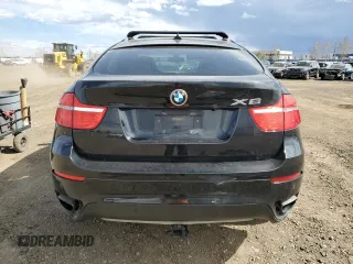 2012 BMW X6 50i z VIN 5UXFG8C59CLZ97450, wystawiony jako Copart lot #55281205 z przebiegiem 188 625 mil mil oraz Czysty tytuł • Clean title. Historia ofert i sprzedaży dostępna na DreamBid. Obrazek 6.