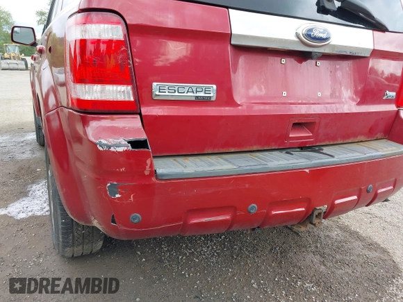 2010 Ford Escape Limited z VIN 1FMCU0EG5AKC21828, wystawiony jako IAAI lot #42343582 z przebiegiem 135 534 mil mil oraz . Historia ofert i sprzedaży dostępna na DreamBid. Obrazek 19.