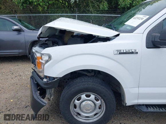 2018 Ford F-150 XL z VIN 1FTFX1E59JKE52129, wystawiony jako IAAI lot #42233231 z przebiegiem 97 262 mil mil oraz . Historia ofert i sprzedaży dostępna na DreamBid. Obrazek 19.
