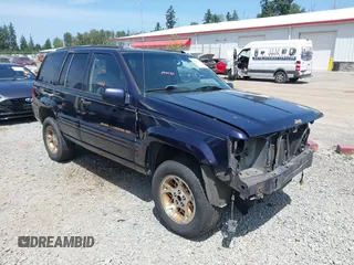 1997 Jeep Grand Cherokee Limited with VIN 1J4GZ78YXVC549289, listed as a IAAI auction lot 42474073 with 265,188 mi miles and . Bid and sale history available at DreamBid. Image 1.