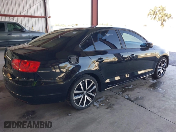 2014 Volkswagen Jetta S z VIN 3VW2K7AJ1EM311148, wystawiony jako IAAI lot #40418942 z przebiegiem 192 015 mil mil oraz . Historia ofert i sprzedaży dostępna na DreamBid. Obrazek 4.
