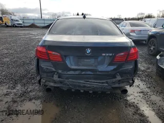 2011 BMW 5 Series 535i xDrive with VIN WBAFU7C59BC778083, listed as a Copart auction lot 48929435 with 105,700 mi miles and Salvage Title. Bid and sale history available at DreamBid. Image 6.