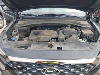 2019 Hyundai Santa Fe SEL with VIN 5NMS33AD2KH068726, listed as a IAAI auction lot 41624718 with 122,310 mi miles and . Bid and sale history available at DreamBid. Image 10.