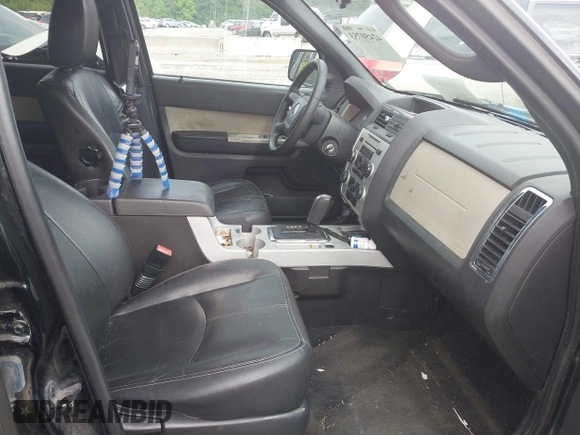 2009 Mercury Mariner Premier with VIN 4M2CU97749KJ15320, listed as a IAAI auction lot 42450753 with 182,172 mi miles and . Bid and sale history available at DreamBid. Image 5.