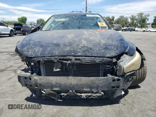 2015 Infiniti Q50 with VIN JN1BV7AP1FM352961, listed as a Copart auction lot 63330875 with 174,300 mi miles and Salvage title. Bid and sale history available at DreamBid. Image 5.