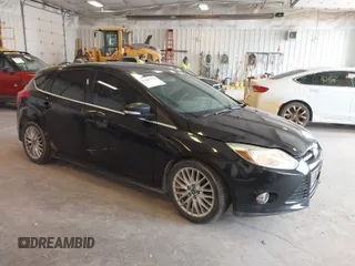 2012 Ford Focus SEL with VIN 1FAHP3M24CL331586, listed as a IAAI auction lot 42086129 with 193,060 mi miles. Bid and sale history available at carsss.com. Image 1.
