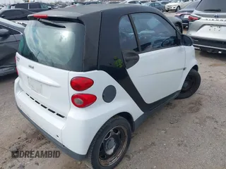 2010 Smart fortwo Pure with VIN WMEEJ3BA5AK390904, listed as a IAAI auction lot 41688922 with Not provided miles and . Bid and sale history available at DreamBid. Image 4.