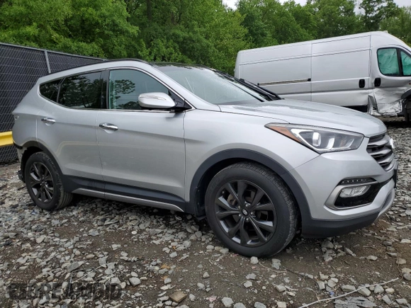 2017 Hyundai Santa Fe Ultimate with VIN 5XYZWDLAXHG435759, listed as a Copart auction lot 55336535 with 82,452 mi miles and Salvage title. Bid and sale history available at DreamBid. Image 4.