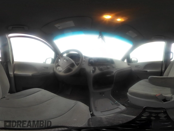 2014 Toyota Sienna L z VIN 5TDZK3DC2ES505680, wystawiony jako IAAI lot #42307763 z przebiegiem 170 628 mil mil oraz . Historia ofert i sprzedaży dostępna na DreamBid. Obrazek 18.