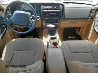 1999 Jeep Cherokee Sport с VIN 1J4FT68S5XL675839, выставлен на аукционе Copart как лот 65230005 с пробегом 204 102 миль миль и Списание • Salvage title. История ставок и продаж доступна на DreamBid. Изображение 8.
