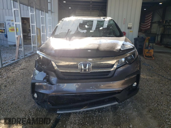 2020 Honda Pilot EX-L z VIN 5FNYF6H55LB042108, wystawiony jako Copart lot #63163755 z przebiegiem Nie podano mil oraz Szkoda całkowita • Salvage title. Historia ofert i sprzedaży dostępna na DreamBid. Obrazek 5.