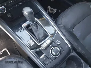 2018 Mazda CX-5 Grand Touring z VIN JM3KFADM7J0327272, wystawiony jako IAAI lot #42279536 z przebiegiem 97 478 mil mil oraz . Historia ofert i sprzedaży dostępna na DreamBid. Obrazek 11.