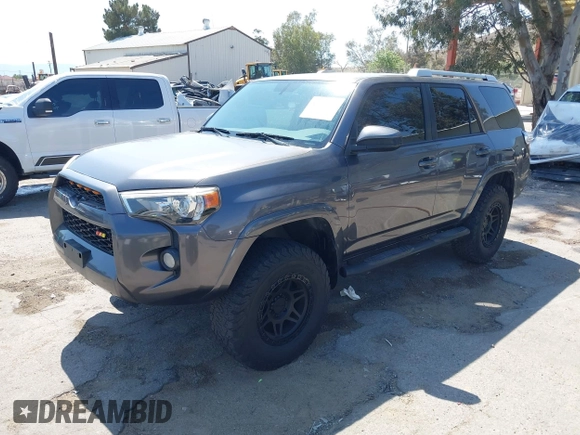 2016 Toyota 4Runner Limited with VIN JTEBU5JR2G5311140, listed as a IAAI auction lot 41973090 with 97,465 mi miles and . Bid and sale history available at DreamBid. Image 2.