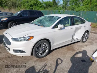 2014 Ford Fusion SE with VIN 3FA6P0H92ER340353, listed as a IAAI auction lot 42126171 with 104,484 mi miles and . Bid and sale history available at DreamBid. Image 2.