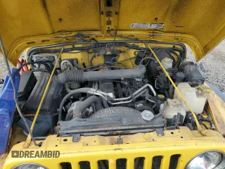 2001 Jeep Wrangler Sport z VIN 1J4FA49S01P355451, wystawiony jako Copart lot #56501545 z przebiegiem 213 027 mil mil oraz Czysty tytuł • Clean title. Historia ofert i sprzedaży dostępna na DreamBid. Obrazek 12.