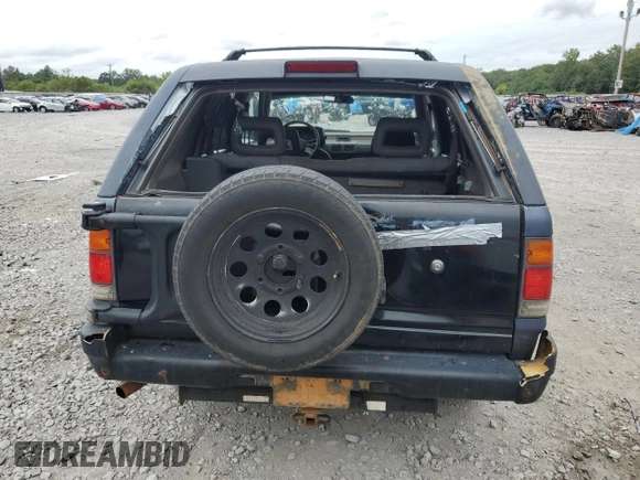 1995 Isuzu Rodeo LS with VIN 4S2CG58V9S4342391, listed as a Copart auction lot 71076344 with 220,708 mi miles and Salvage Title. Bid and sale history available at carsss.com. Image 6.