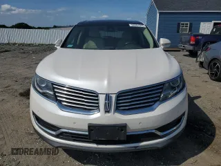 2016 Lincoln MKX Reserve with VIN 2LMTJ8LPXGBL38015, listed as a Copart auction lot 60981375 with 101,589 mi miles and Salvage title. Bid and sale history available at DreamBid. Image 5.