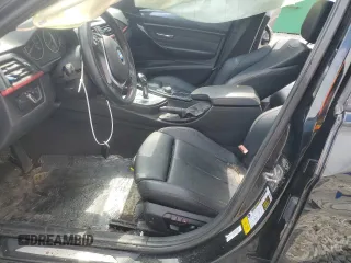 2014 BMW 3 Series 328i with VIN WBA3C1C50EK105938, listed as a Copart auction lot 57499235 with 147,083 mi miles and Salvage title. Bid and sale history available at DreamBid. Image 7.