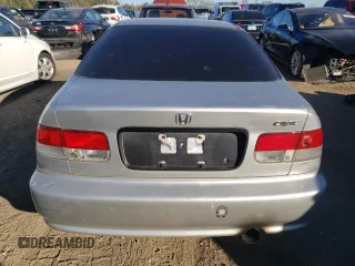 1999 Honda Civic DX with VIN 1HGEJ612XXL034351, listed as a Copart auction lot 76589714 with 192,975 mi miles and Salvage Title. Bid and sale history available at carsss.com. Image 6.