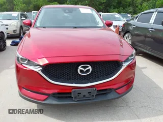 2017 Mazda CX-5 Touring with VIN JM3KFACL2H0197985, listed as a IAAI auction lot 42069182 with 184,734 mi miles. Bid and sale history available at carsss.com. Image 6.