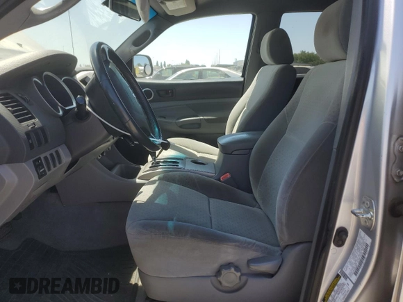 2007 Toyota Tacoma PreRunner with VIN 3TMJU62N77M028907, listed as a Copart auction lot 59622695 with 186,339 mi miles and Salvage title. Bid and sale history available at DreamBid. Image 7.