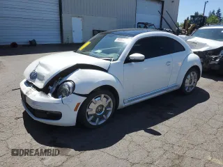 2013 Volkswagen Beetle 2.5L w/Sun/Sound/Nav с VIN 3VWJP7AT6DM609529, выставлен на аукционе Copart как лот 59235255 с пробегом 81 901 миль миль и Чистый • Clean title. История ставок и продаж доступна на DreamBid. Изображение 1.