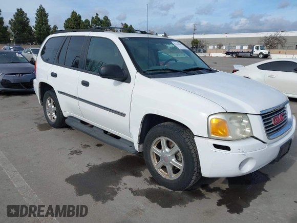 2008 GMC Envoy SLE1 with VIN 1GKDS13S482171739, listed as a IAAI auction lot 41613890 with 233,268 mi miles and . Bid and sale history available at DreamBid. Image 1.