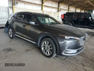 2016 Mazda CX-9 Grand Touring с VIN JM3TCADY3G0119947, выставлен на аукционе Copart как лот 57904515 с пробегом 94 251 миль миль и Списание • Salvage title. История ставок и продаж доступна на DreamBid. Изображение 4.