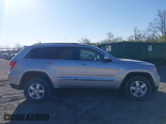 2013 Jeep Grand Cherokee Laredo with VIN 1C4RJFAG3DC586667, listed as a IAAI auction lot 42041524 with 100,635 mi miles. Bid and sale history available at carsss.com. Image 13.