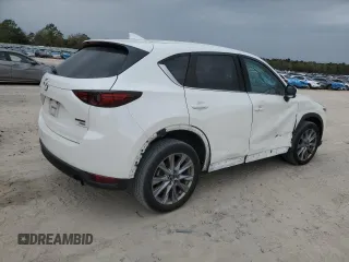 2021 Mazda CX-5 Grand Touring Reserve with VIN JM3KFBAY5M0320404, listed as a Copart auction lot 50405075 with 32,596 mi miles and Salvage Title. Bid and sale history available at carsss.com. Image 3.