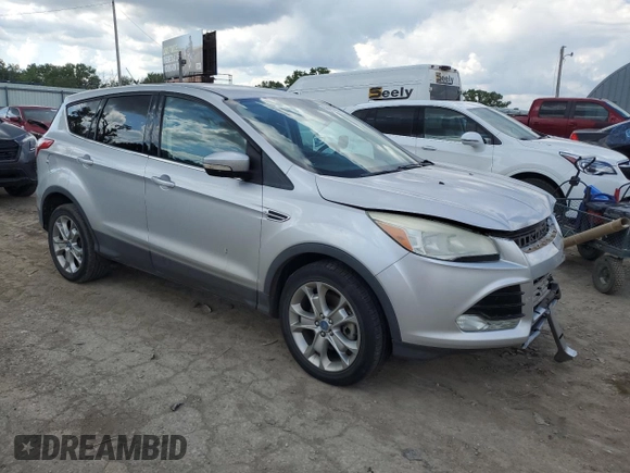 2013 Ford Escape SEL with VIN 1FMCU9HX1DUB15143, listed as a Copart auction lot 56237095 with 127,017 mi miles and Salvage title. Bid and sale history available at DreamBid. Image 4.