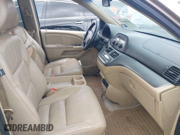 2007 Honda Odyssey EX-L z VIN 5FNRL38717B102646, wystawiony jako IAAI lot #42380196 z przebiegiem 234 088 mil mil oraz . Historia ofert i sprzedaży dostępna na DreamBid. Obrazek 5.