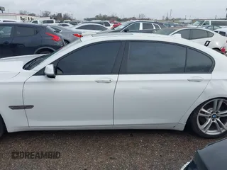 2015 BMW 7 Series 740Li with VIN WBAYE4C54FD947205, listed as a IAAI auction lot 41566291 with 172,729 mi miles and . Bid and sale history available at DreamBid. Image 14.