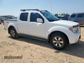 2012 Nissan Frontier Pro-4X with VIN 1N6AD0EV3CC468057, listed as a Copart auction lot 60432675 with 100,088 mi miles and Salvage title. Bid and sale history available at DreamBid. Image 4.