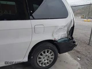 2003 Kia Sedona LX with VIN KNDUP131536402900, listed as a IAAI auction lot 41500260 with 143,825 mi miles and . Bid and sale history available at DreamBid. Image 6.