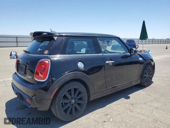 2017 MINI Hardtop Cooper S with VIN WMWXP7C52H2A44625, listed as a Copart auction lot 58011895 with 79,238 mi miles and Salvage title. Bid and sale history available at DreamBid. Image 3.