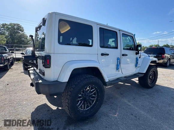 2012 Jeep Wrangler Unlimited Altitude z VIN 1C4HJWEG5CL222948, wystawiony jako Copart lot #61101825 z przebiegiem 106 991 mil mil oraz Czysty tytuł • Clean title. Historia ofert i sprzedaży dostępna na DreamBid. Obrazek 4.