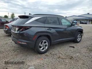 2023 Hyundai Tucson SEL with VIN 5NMJBCAE5PH186784, listed as a Copart auction lot 62896985 with 13,633 mi miles and Salvage title. Bid and sale history available at DreamBid. Image 3.