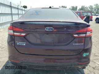 2017 Ford Fusion Titanium z VIN 3FA6P0SU8HR313773, wystawiony jako Copart lot #58791695 z przebiegiem 141 777 mil mil oraz Czysty tytuł • Clean title. Historia ofert i sprzedaży dostępna na DreamBid. Obrazek 6.
